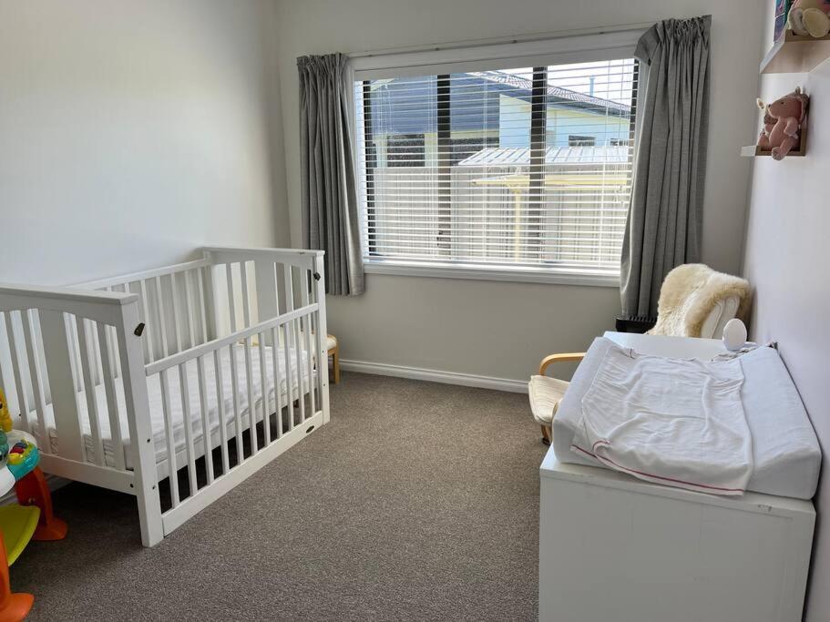 Sunny Delight In Clive Villa Bagian luar foto