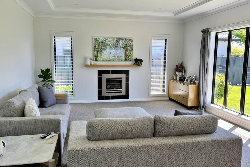 Sunny Delight In Clive Villa Bagian luar foto